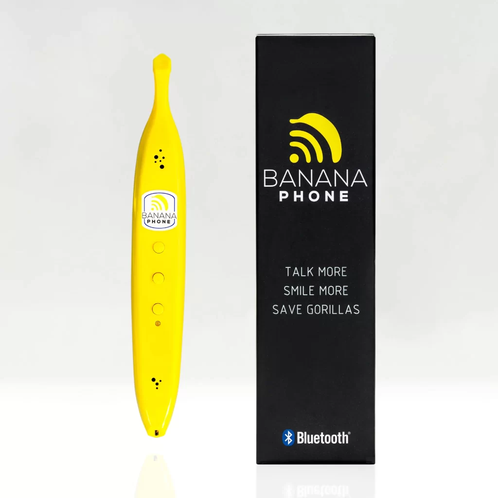 A bluetooth phone in the shape of a banana. On the right of an image is a black box that says "Banana phone Talk More Smile More Save Gorillas." At the bottom is the bluetooth logo and the word Bluetooth.